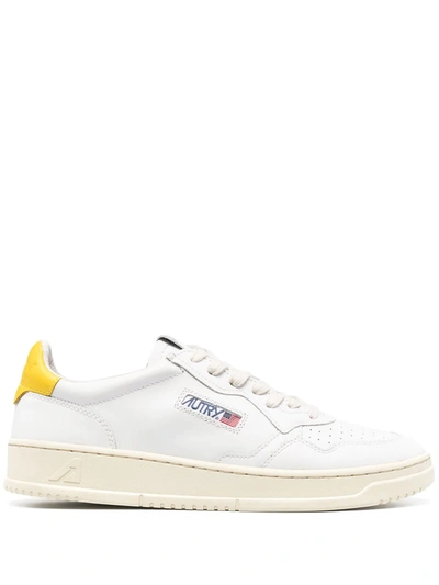 Shop Autry Low-top Leather Sneakers In White