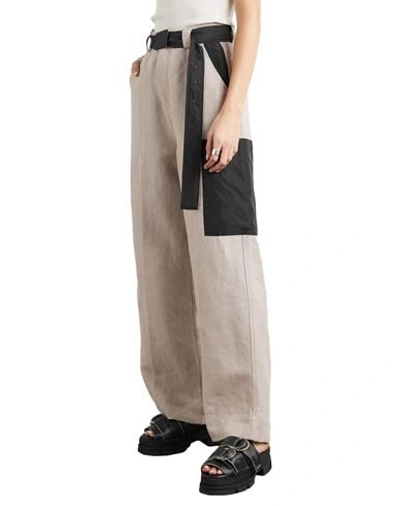 Shop Ganni Pants In Beige