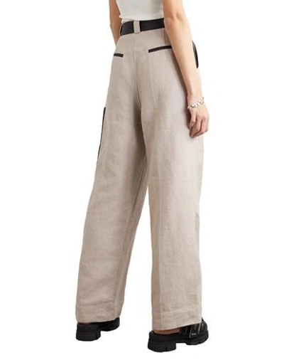 Shop Ganni Pants In Beige