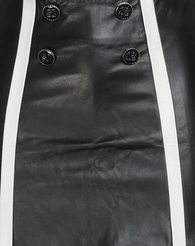 Sandro Mini Skirts In Black