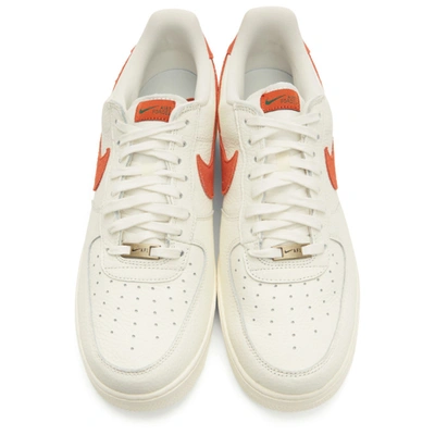 Shop Nike White And Orange Air Force 1 07 Craft Sneakers In Sai/man/ora