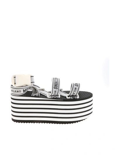 MOSCHINO TAPE LOGO WEDGE SANDALS IN WHITE 