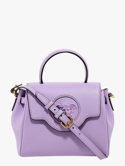 Shop Versace Handbag In Purple