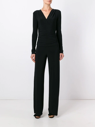 Shop Norma Kamali V-necked Jumpsuit In Black