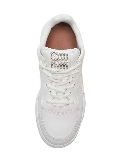 Shop Alaïa Baskets Leather Sneakers In White