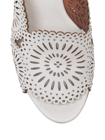 Shop Alaïa Women's Perforated Leather Mules In White