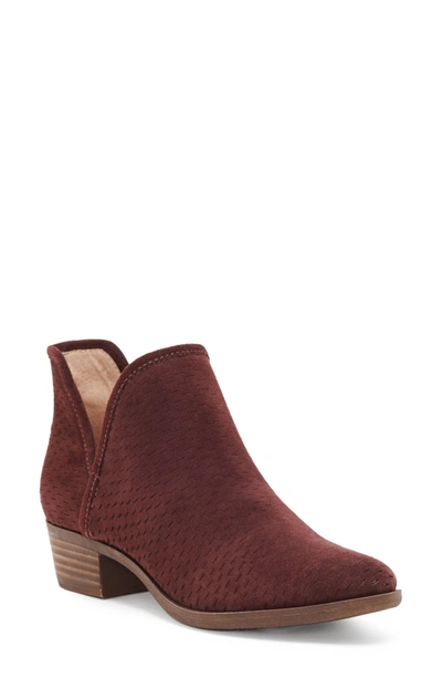 Shop Lucky Brand Baley Perforated Suede Bootie In Raisin Suede