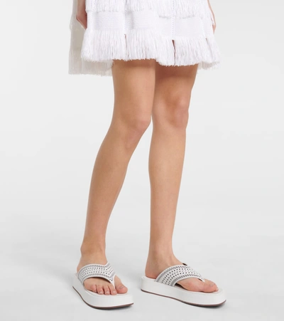 Shop Alaïa Laser-cut Leather Thong Sandals In White