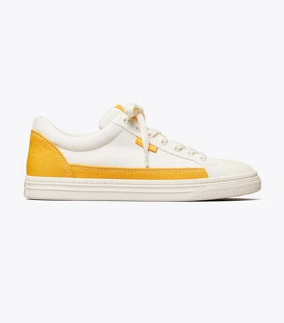 Shop Tory Burch Classic Court Sneaker In Ivory Canvas/ Curry Yellow