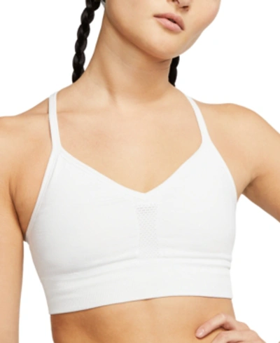 Shop Nike Women's Indy Dri-fit Seamless Cross-back Low Impact Sports Bra In Summit White/platinum Tint