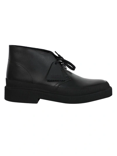 Shop Clarks Galosh Boots In Black