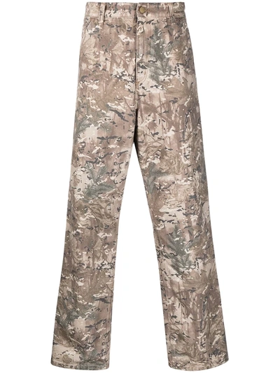 Shop Carhartt Camouflage Print Trousers In Green