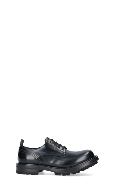 Shop Alexander Mcqueen Laced Shoes In Black
