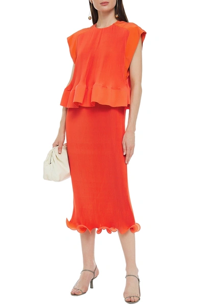 Shop Tibi Ruffled Plissé Crepe De Chine Peplum Midi Dress In Bright Orange