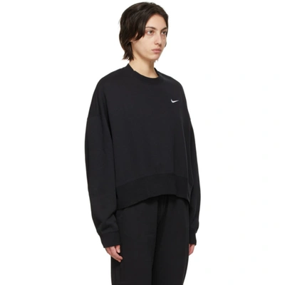 Shop Nike Black Sportswear Essential Sweatshirt In 010 Black/w