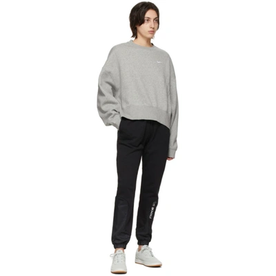 Shop Nike Grey Sportswear Essential Sweatshirt In 063 Dk Grey