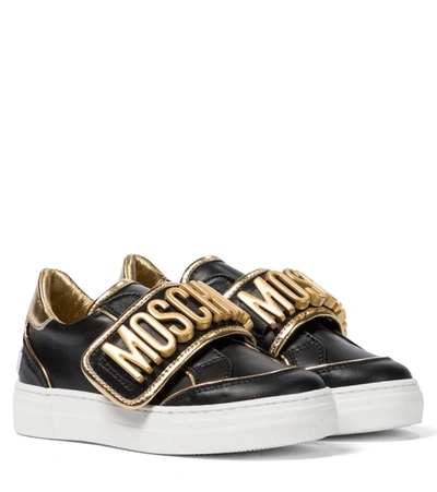 Shop Moschino Logo Leather Sneakers In Black