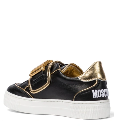Shop Moschino Logo Leather Sneakers In Black