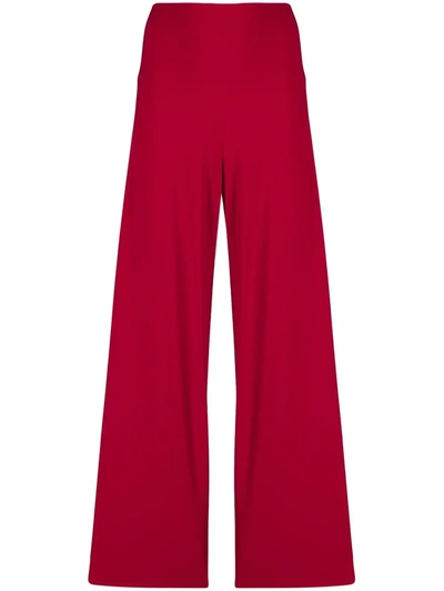 Shop Norma Kamali Wide-leg Flared Trousers In Red