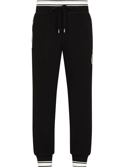 Shop Dolce & Gabbana Crest Logo Embroidered Track Pants In Black