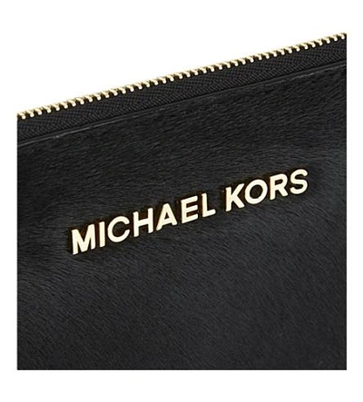 Shop Michael Michael Kors Bedford Calfhair Zipped Clutch In Black