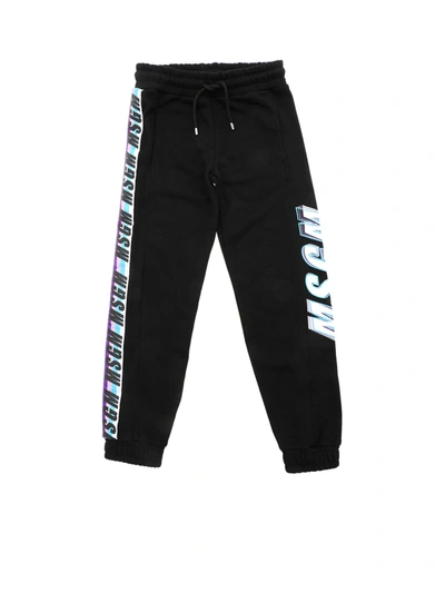 Shop Msgm Logo Print Track Pants In Black