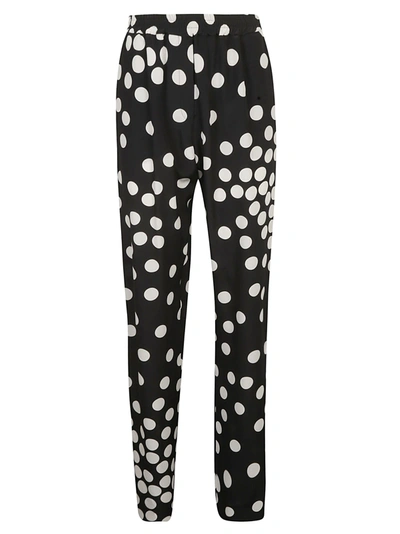 Shop Valentino Dotted Print Trousers In Black/ivory