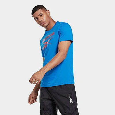 Shop Reebok Men's Graphic Series Stacked T-shirt In Blue Sport