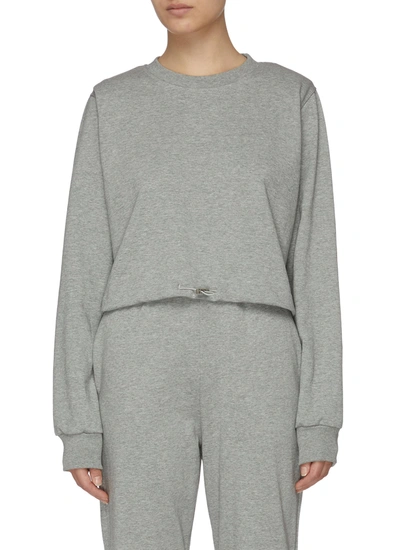 Shop The Frankie Shop Padded Shoulder Retractable Drawstring Hem Cotton Sweatshirt In Grey