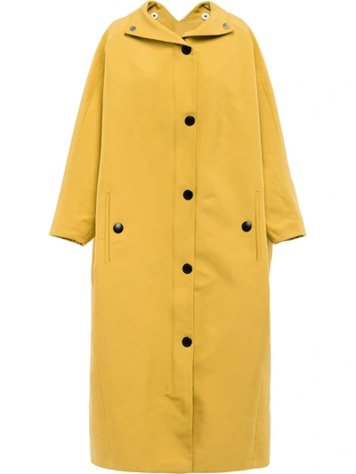 Shop Prada Single-breasted Hooded Raincoat In Yellow