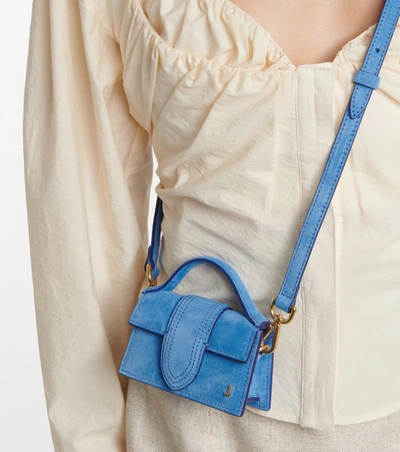Shop Jacquemus Le Petit Bambino Suede Shoulder Bag In Blue