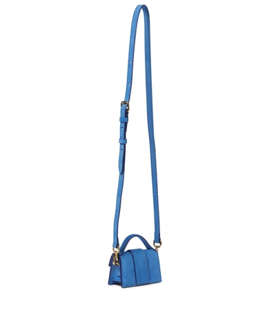 Shop Jacquemus Le Petit Bambino Suede Shoulder Bag In Blue