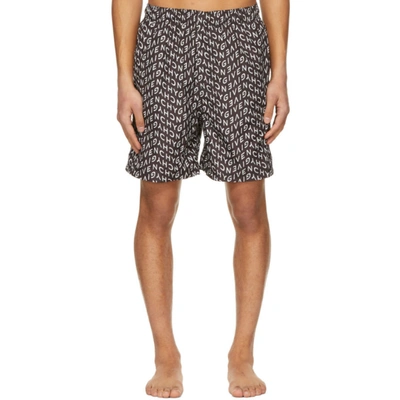 Shop Givenchy Black & White Allover Refracted Logo Shorts In 004 Black/w