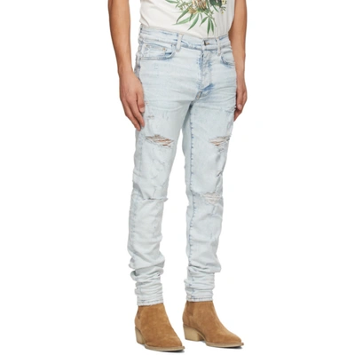 Shop Amiri Blue Thrasher Plus Jeans In Vintage Sky Indigo