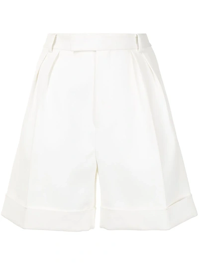 Shop Khaite Magdeline Pleat-front Faille Shorts In White