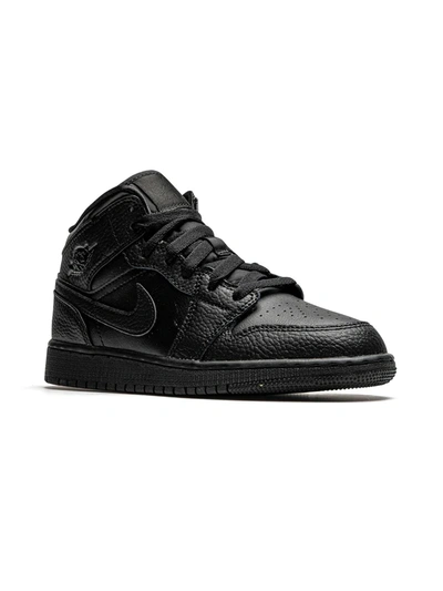 Shop Jordan Air  1 Mid "triple Black" Sneakers