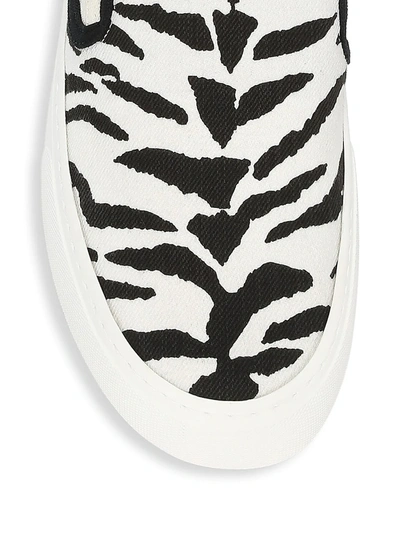 Shop Saint Laurent Men's Venice Zebra-stripe Canvas Slip-on Sneakers In White Black