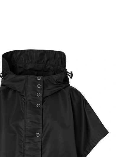 Shop Burberry Horseferry Print Recycled Nylon Hooded Cape In Black