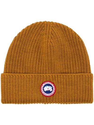 Shop Canada Goose Logo-patch Ribbed-knit Beanie In Yellow