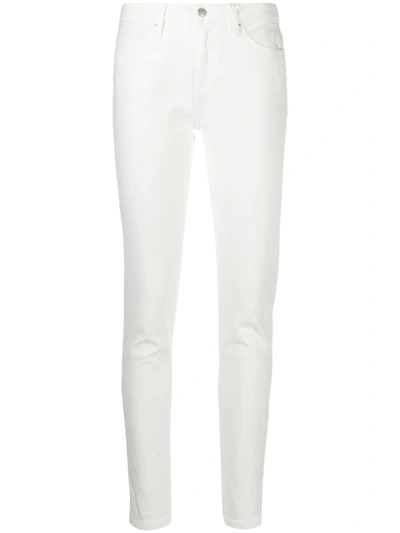 Shop Tommy Hilfiger Mid-rise Skinny Jeans In White