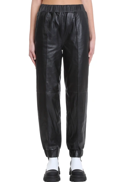 Shop Ganni Pants In Black Leather