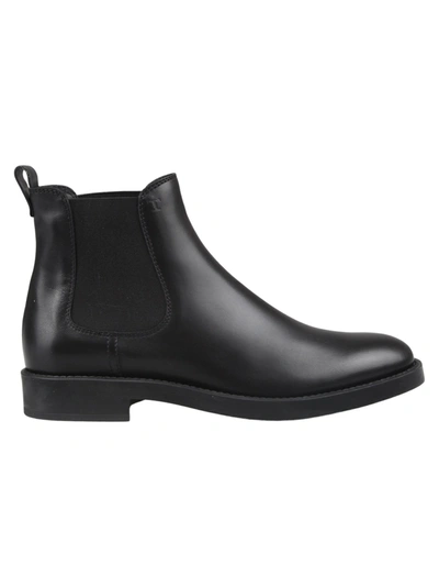 Shop Tod's Monogram Stamped Ankle Boots In Black