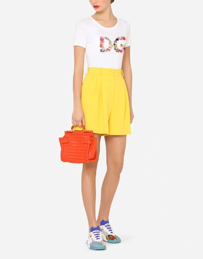 Shop Dolce & Gabbana Short-sleeved Jersey T-shirt With Dg Button Embellishment In White