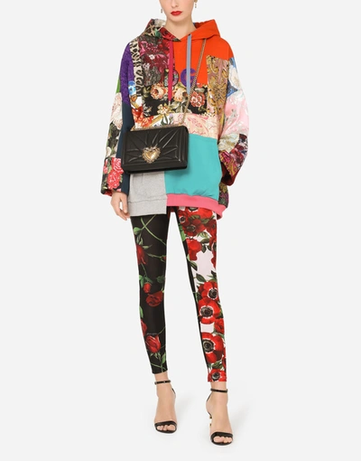 Shop Dolce & Gabbana Jersey Leggings With Anemone And Rose Print