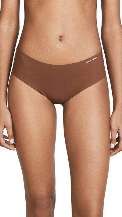 Shop Calvin Klein Underwear Invisibles Hipster Panties In Spruce