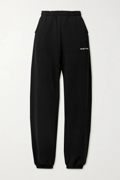 Shop Sporty And Rich Embroidered Cotton-jersey Track Pants In Black