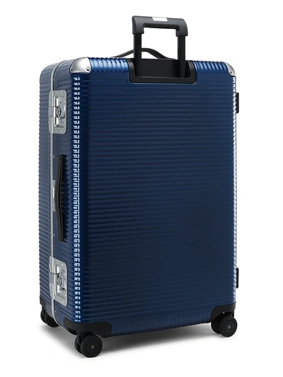 Shop Fpm Men's Bank Light Check-in Spinner Suitcase In Indigo Blue