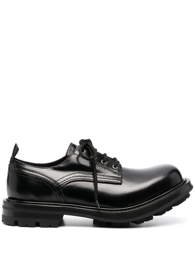 Shop Alexander Mcqueen Ridged Sole Lace-up Shoes In Black