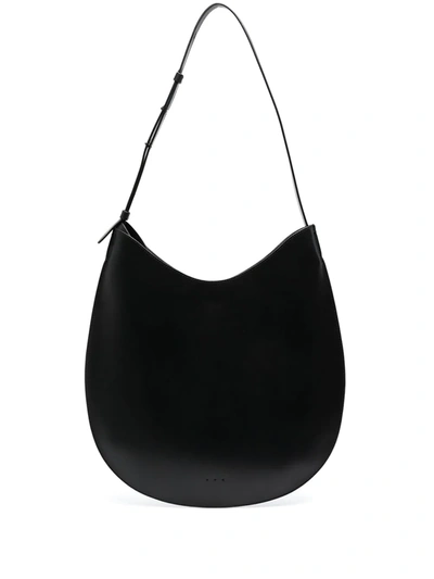 Shop Aesther Ekme Flat Hobo Shoulder Bag In Black