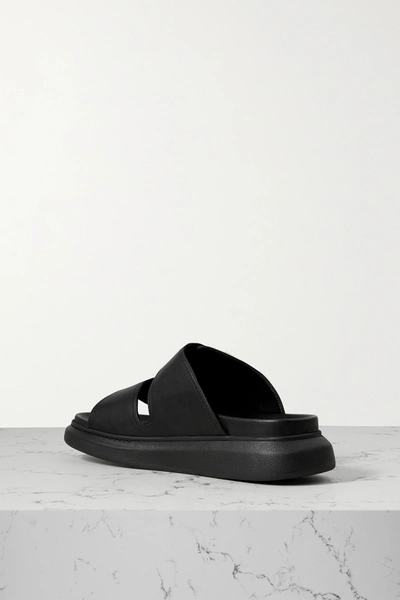 Shop Alexander Mcqueen Leather Exaggerated-sole Sandals In Black